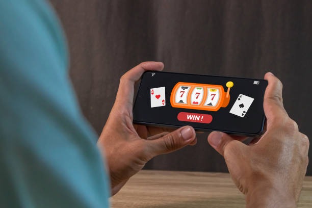 Live Casino Hold'em table with dealer and community cards visible